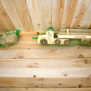 photo of a large and small wooden log truck toy