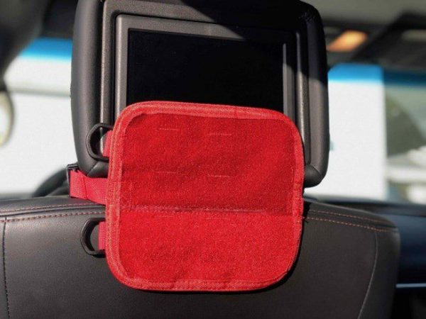 photo of a red plc operator/driver first aid small pack holder that attaches to a vehicle's head rest